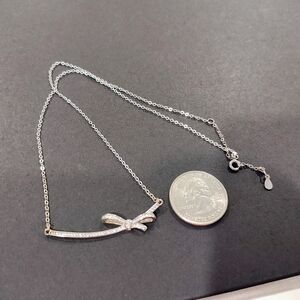 Knot Moissanite Pendant Necklace in Sterling Silver